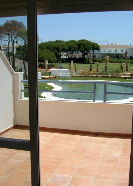 View of balcony and beyond from master bedroom